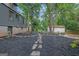 Landscaped backyard with mulch and stone pathway leading to shed at 1042 Faith Se Ave, Atlanta, GA 30316