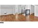 Living room features a fireplace, hardwood flooring, and natural light from windows at 1042 Faith Se Ave, Atlanta, GA 30316