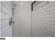 Modern shower with white subway tile at 1042 Faith Se Ave, Atlanta, GA 30316