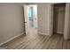 Cozy bedroom featuring new flooring and closet with sliding doors at 17 Brittany Ne Way, Atlanta, GA 30324
