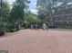 Community entrance with a brick road and a gated entrance at 17 Brittany Ne Way, Atlanta, GA 30324