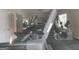 Modern gym featuring treadmills and weight-lifting equipment at 17 Brittany Ne Way, Atlanta, GA 30324