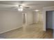 Neutral living room with open doorway and updated flooring at 17 Brittany Ne Way, Atlanta, GA 30324