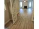 Open-concept living room with modern flooring and plenty of natural light at 17 Brittany Ne Way, Atlanta, GA 30324