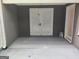 Covered patio area with double doors and plenty of space for outdoor enjoyment and relaxation at 17 Brittany Ne Way, Atlanta, GA 30324