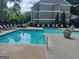 Community pool with lounge chairs and clean water at 17 Brittany Ne Way, Atlanta, GA 30324