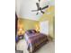 Bedroom featuring a ceiling fan, carpeted floor, and natural lighting at 120 Hawken Trl, Mcdonough, GA 30253