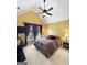 Bedroom featuring a ceiling fan, carpeted floor, and natural lighting at 120 Hawken Trl, Mcdonough, GA 30253
