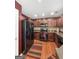 Well-equipped kitchen featuring wood cabinets and black appliances at 120 Hawken Trl, Mcdonough, GA 30253
