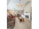 Comfortable living room featuring a fireplace, plush seating, and neutral decor at 120 Hawken Trl, Mcdonough, GA 30253