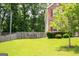 Exterior side view of a two-story home with a green lawn at 1849 Wanda Way, Ellenwood, GA 30294