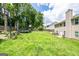 Fenced backyard with mature trees, trampoline, and play set at 1849 Wanda Way, Ellenwood, GA 30294