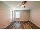 Bright bedroom with wood floors features a large window, providing ample natural light and ventilation at 1849 Wanda Way, Ellenwood, GA 30294