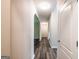 Hallway with hardwood floors and white trim at 1849 Wanda Way, Ellenwood, GA 30294