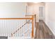 Upstairs hallway leads to rooms with bright white trim and modern flooring at 1849 Wanda Way, Ellenwood, GA 30294