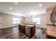 Open kitchen design featuring a breakfast bar with a stainless steel dishwasher at 1849 Wanda Way, Ellenwood, GA 30294