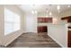 Charming kitchen with breakfast nook, stylish lighting, and functional design at 1849 Wanda Way, Ellenwood, GA 30294