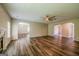 Spacious living room featuring a fireplace, hardwood floors, and neutral walls at 1849 Wanda Way, Ellenwood, GA 30294