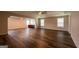 Open living area featuring recessed lighting, vinyl flooring, and large windows at 1849 Wanda Way, Ellenwood, GA 30294