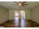 Living room featuring hardwood floors and open entryways at 1849 Wanda Way, Ellenwood, GA 30294