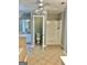 Full bathroom with white tiled shower and walk-in bathtub at 1433 Cotton Sw Trl, Conyers, GA 30094