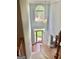 Foyer with staircase, large window, and front door views at 1433 Cotton Sw Trl, Conyers, GA 30094