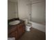 Bathroom with tile flooring, a shower-tub combo, and a vanity at 14104 Fairington Ridge Cir, Lithonia, GA 30038