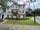 Exterior view of a two story residential apartment building with brick and gray siding at 14104 Fairington Ridge Cir, Lithonia, GA 30038