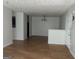 This large living room has laminate floors and neutral-colored walls that offer a versatile space at 14104 Fairington Ridge Cir, Lithonia, GA 30038