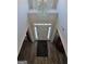 Grand foyer with hardwood floors, chandelier, and view of the front door at 5725 Lake Windsor Pkwy, Buford, GA 30518