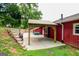 Backyard patio area with steps up to backyard at 125 Point View Ct, Tyrone, GA 30290