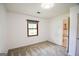 Bedroom featuring neutral walls, gray carpet and a view into an ensuite bathroom at 125 Point View Ct, Tyrone, GA 30290