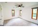 Bright bedroom with new carpet and wooden window trim at 125 Point View Ct, Tyrone, GA 30290