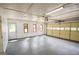 Spacious garage with automatic door, and exterior doors at 125 Point View Ct, Tyrone, GA 30290