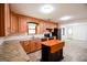 Traditional eat-in kitchen featuring granite counters, a center island and stainless steel appliances at 125 Point View Ct, Tyrone, GA 30290