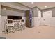Spacious basement office area featuring two desks and a server rack at 383 Beaumont Farms Dr, Sharpsburg, GA 30277
