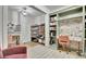Office with built-in desk, shelving, and neutral decor at 383 Beaumont Farms Dr, Sharpsburg, GA 30277