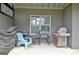 Backyard outdoor patio area equipped with a barbecue grill and covered cooking station at 383 Beaumont Farms Dr, Sharpsburg, GA 30277