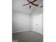 Bedroom showcasing vaulted ceilings, carpet, and a ceiling fan at 1601 Celestial Ct, Mcdonough, GA 30253
