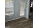 Bright breakfast nook with large window and convenient back door access at 1601 Celestial Ct, Mcdonough, GA 30253