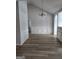 Dining room boasting wainscoting and a modern chandelier at 1601 Celestial Ct, Mcdonough, GA 30253