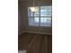Cozy dining area featuring wood floors and natural lighting at 1601 Celestial Ct, Mcdonough, GA 30253