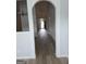Inviting hallway with architectural columns and bright, natural light at 1601 Celestial Ct, Mcdonough, GA 30253