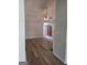 Bright, airy living room featuring wood-look flooring and a ceiling fan at 1601 Celestial Ct, Mcdonough, GA 30253