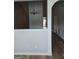 Open living area featuring wood-look flooring and architectural details at 1601 Celestial Ct, Mcdonough, GA 30253