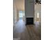 Spacious living room features a fireplace and hardwood floors at 1601 Celestial Ct, Mcdonough, GA 30253