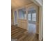Open-concept living room with decorative wall molding at 1601 Celestial Ct, Mcdonough, GA 30253