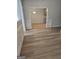 Bright living room boasts hardwood floors and decorative molding at 1601 Celestial Ct, Mcdonough, GA 30253