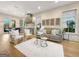 Bright and inviting living room featuring hardwood floors and stylish neutral decor at 130 Glasgow Ln, Fayetteville, GA 30214