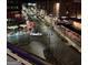 Charming city street view at night with outdoor seating and twinkling lights at 130 Glasgow Ln, Fayetteville, GA 30214